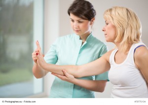 Blonde woman during rehabilitation after wrist injury